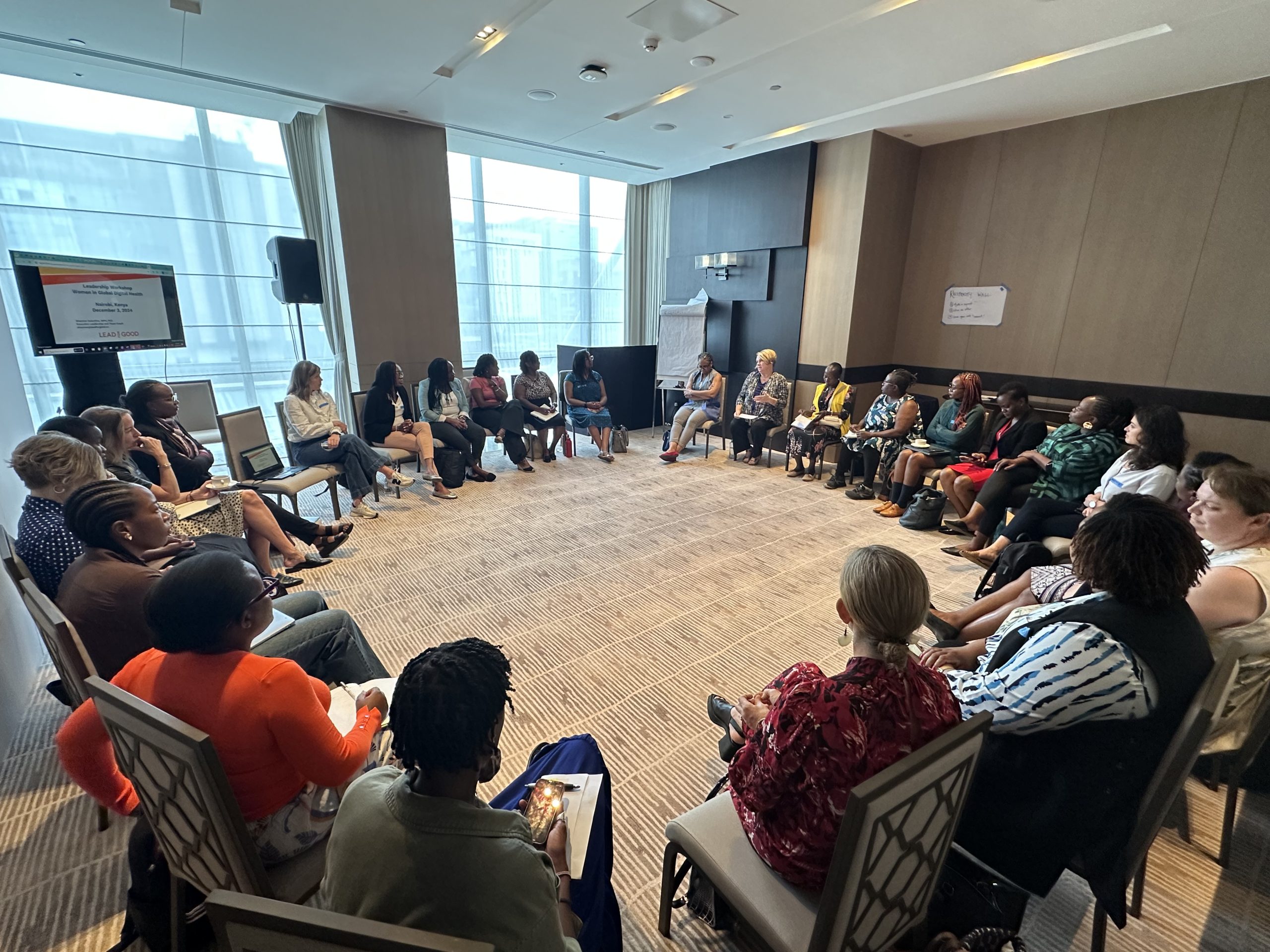 GLOW participants seated in a circle during a 2024 leadership workshop
